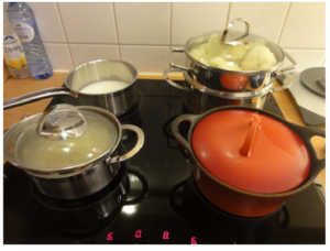Pots and pans on a kitchen range