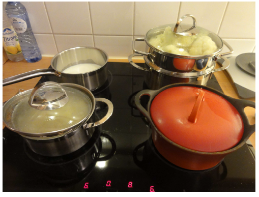 Kitchen stove with pots and pans