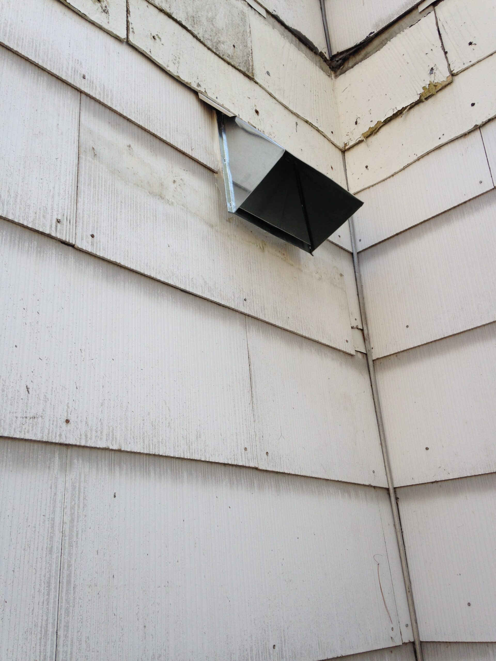 exterior of house with exhaust vent