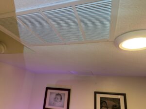 Photo of a ceiling-mounted grille.