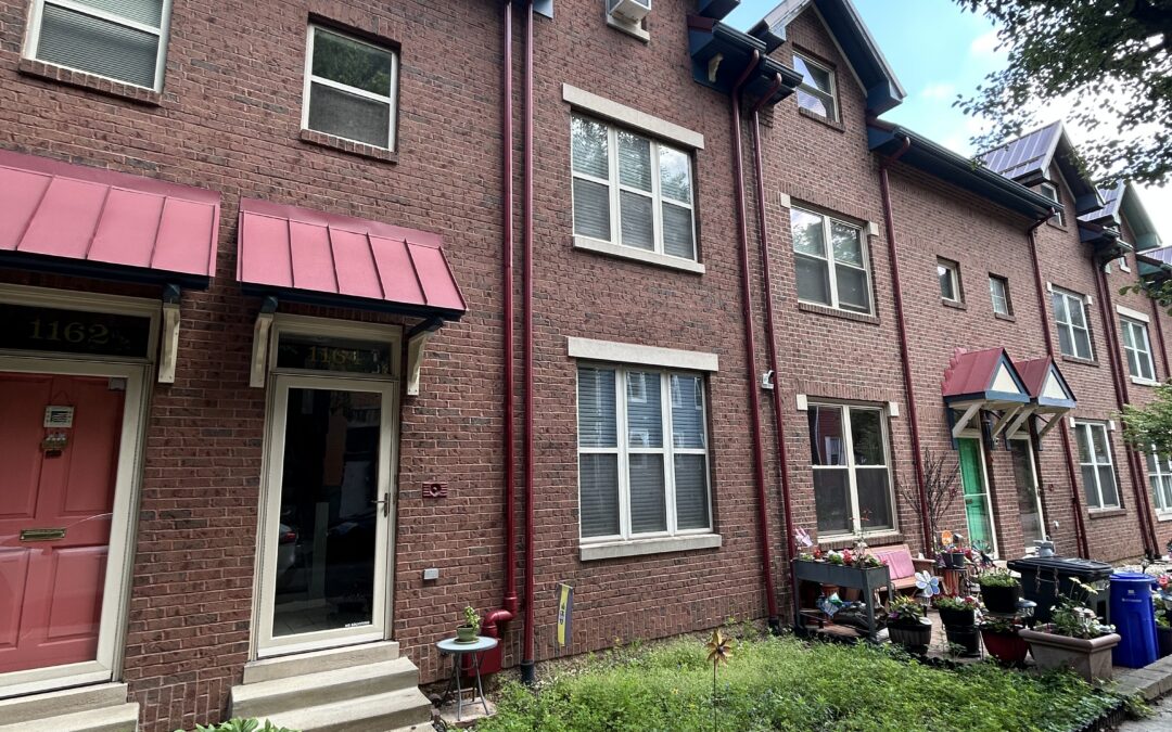 Photo of the exterior of a brick row house