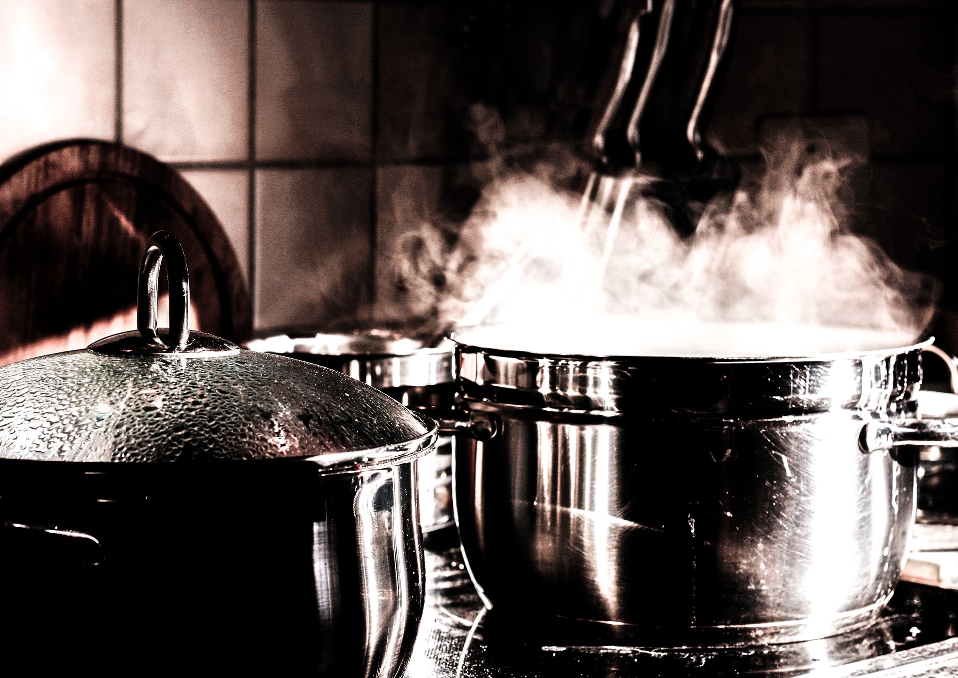 A pot on a stove with steam coming out